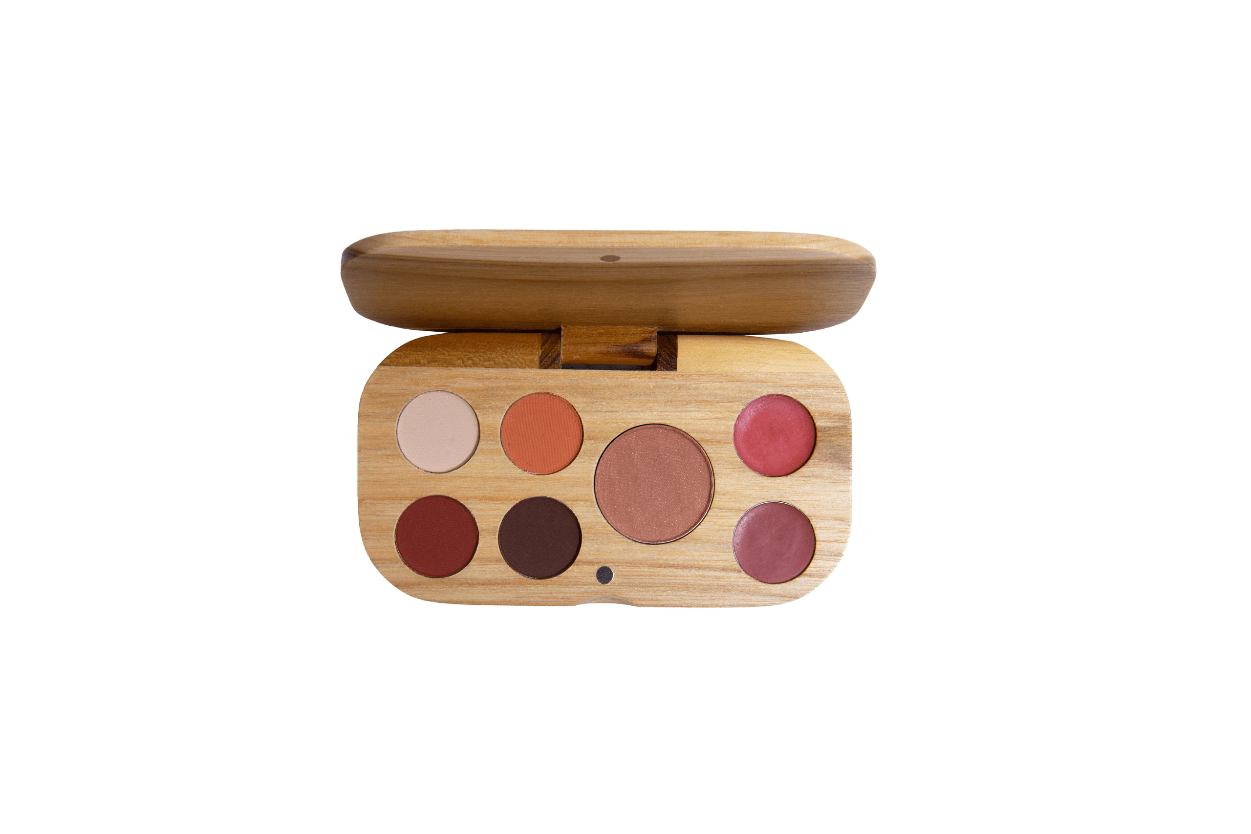 Paleta combinada que contiene 4 sombras compactas tonos tierra, 1 rubor y 2 labiales